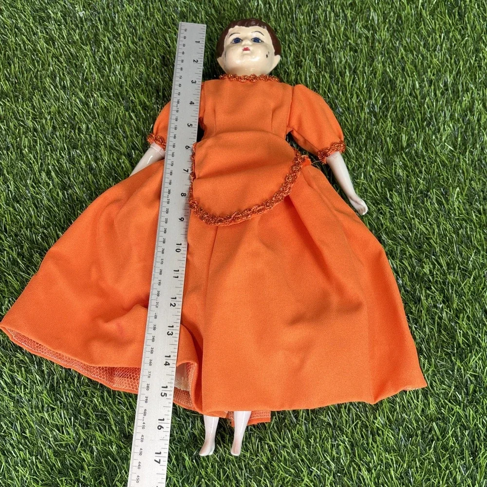 Vintage German Porcelain Doll‎ Orange Dress Hand Painted Face AS IS